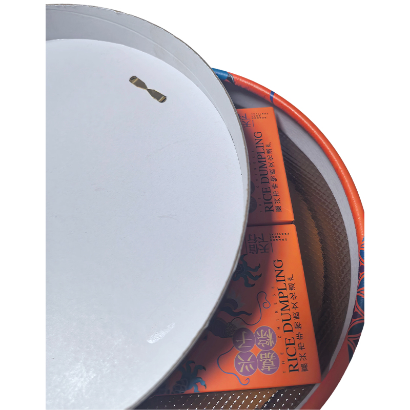 How can the structural stability of paper drum packaging boxes be ensured in humid environments?